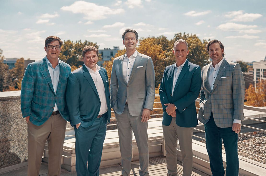 Capital Stewardship Partners team standing together outside